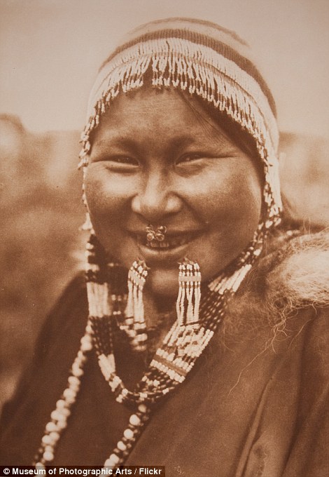 00578-2957360-Images_of_the_Nunivak_tribeswomen_wearing_beaded_hats_Curtis_vis-a-5_1424250374453.