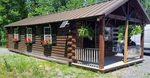 432-Sq.-Ft.-Log-Cabin-w-Ground-Floor-Bedroom-9.&fb_obo=1&utld=tinyhousetalk.com&stp=c0.5000x0.