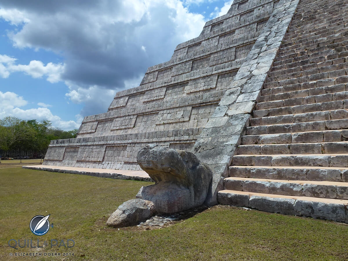 Chichen-Itza-El-Castillo-serpent-head-bottom-stairs.