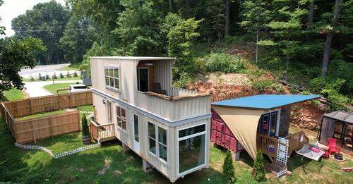 livinginacontainer.com%2Fwp-content%2Fuploads%2F2021%2F12%2FContainer-House-in-Centre-of-Trees-4.