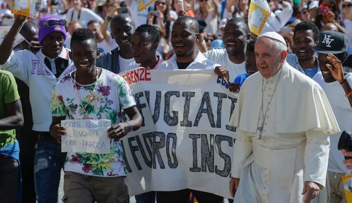 Pope-Francis-and-migrants.