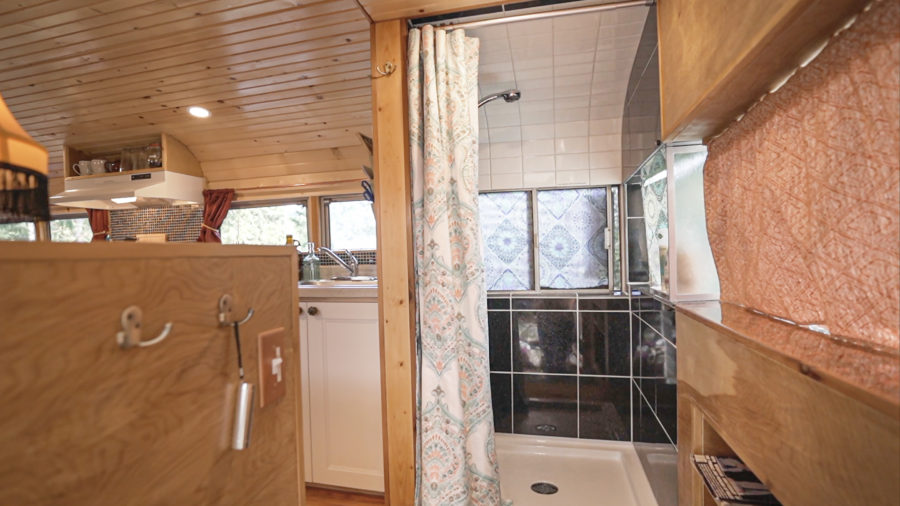 Retro-1969-School-Bus-Tiny-House-Conversion-Shower-900x506.