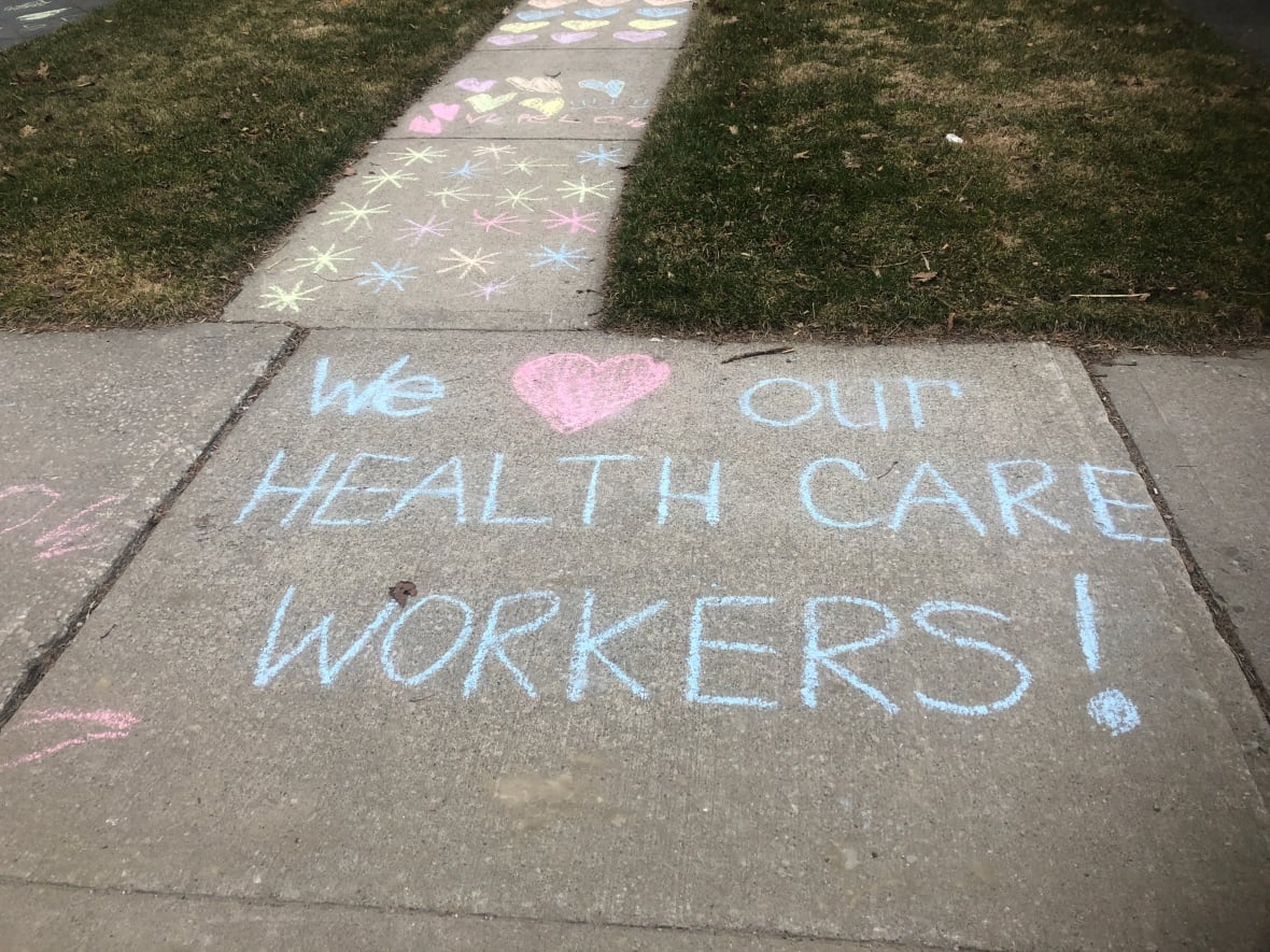 support-for-health-care-workers-is-written-in-chalk-in-the-east-end-of-toronto.