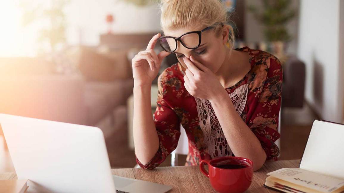 tired-woman-at-desk.